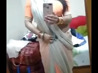Desi Bhabhi in saree showing outstanding boobs  Bangla