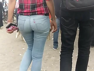 Sexy Indian round exasperation girl walking adjacent to public
