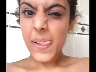 Indian chick showing her tits and pussy